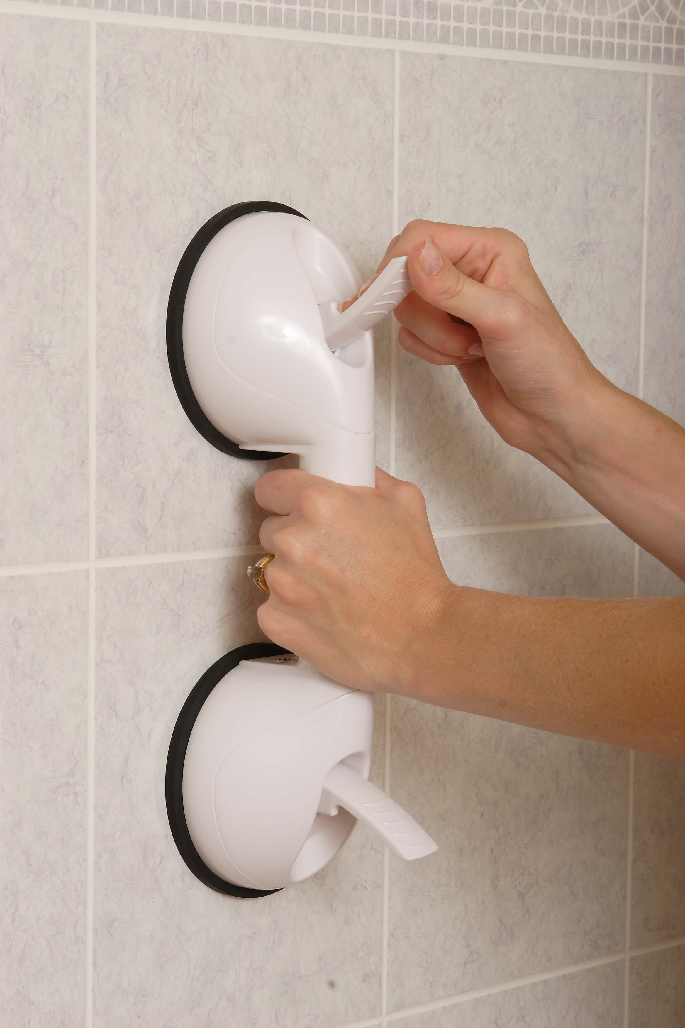 Grab bar installed on tile with no drilling and no wall damage